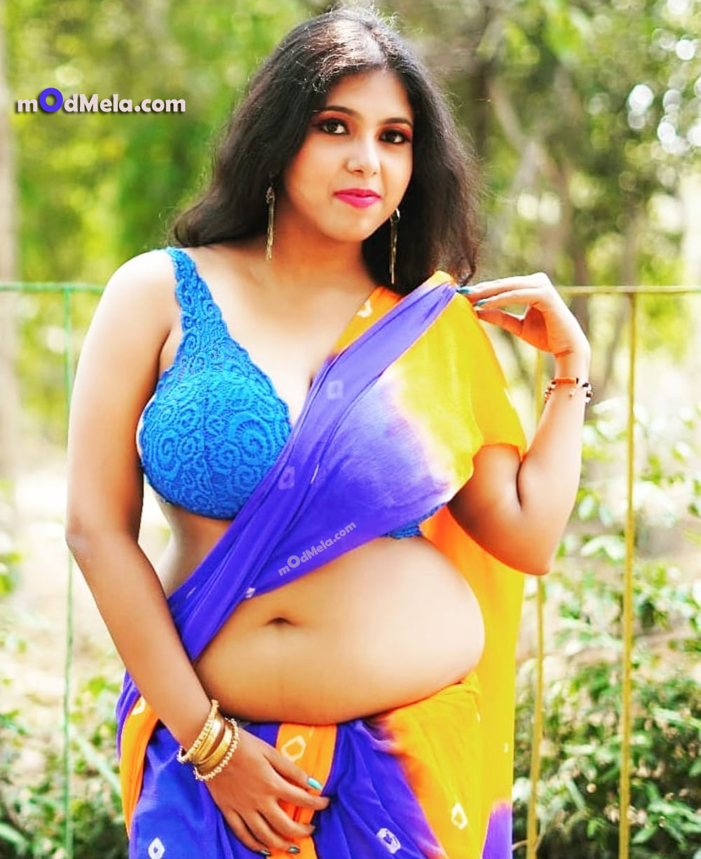 blue lace cleave less blouse with sari front Pose