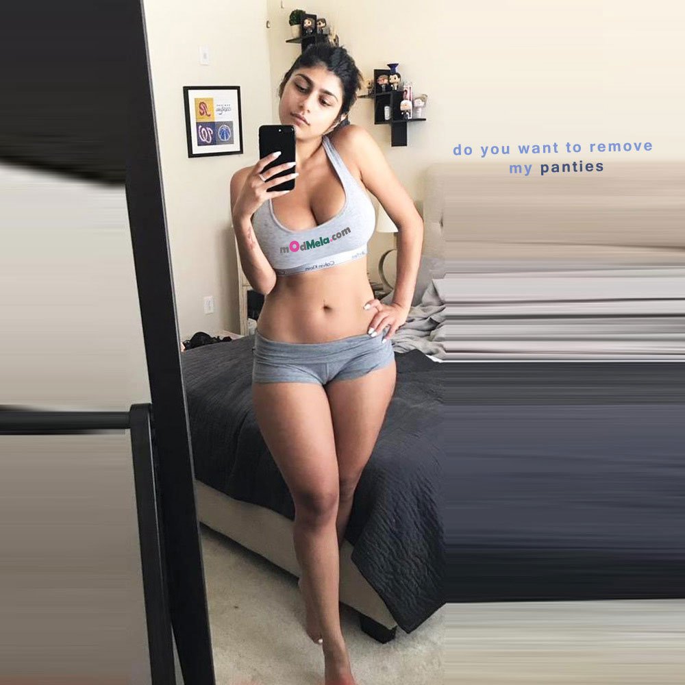 mia in grey shorts top selfie