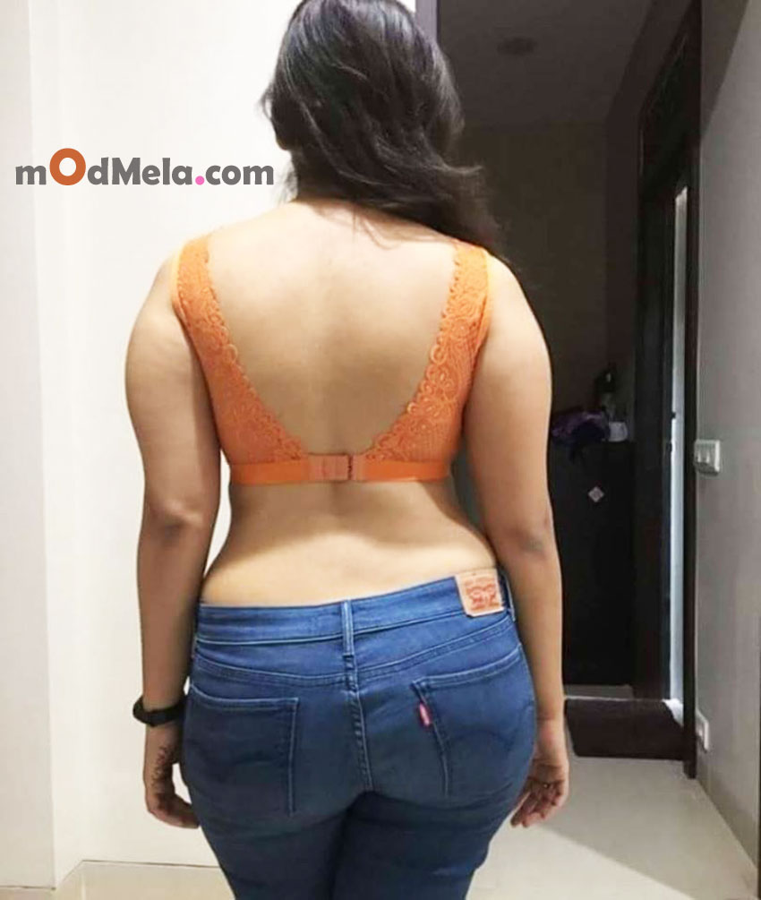 orange lace blouse and jeans