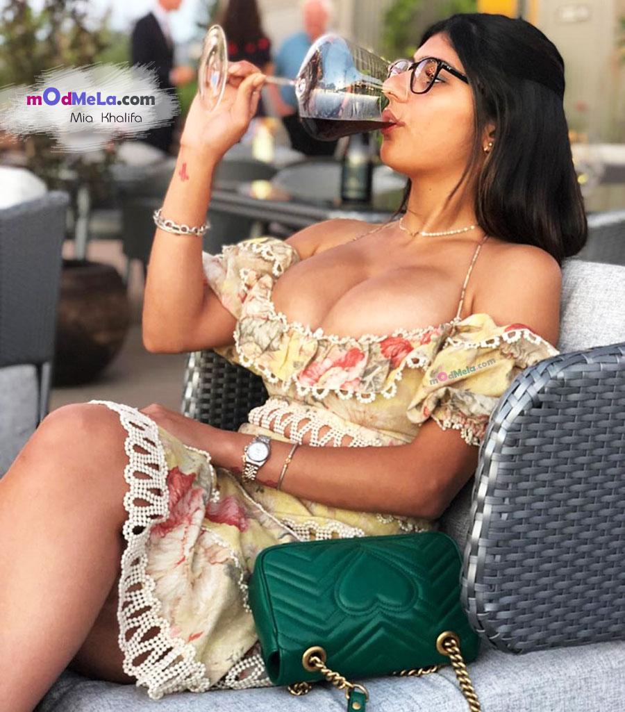 Mia khalifa drinks in pretty frock