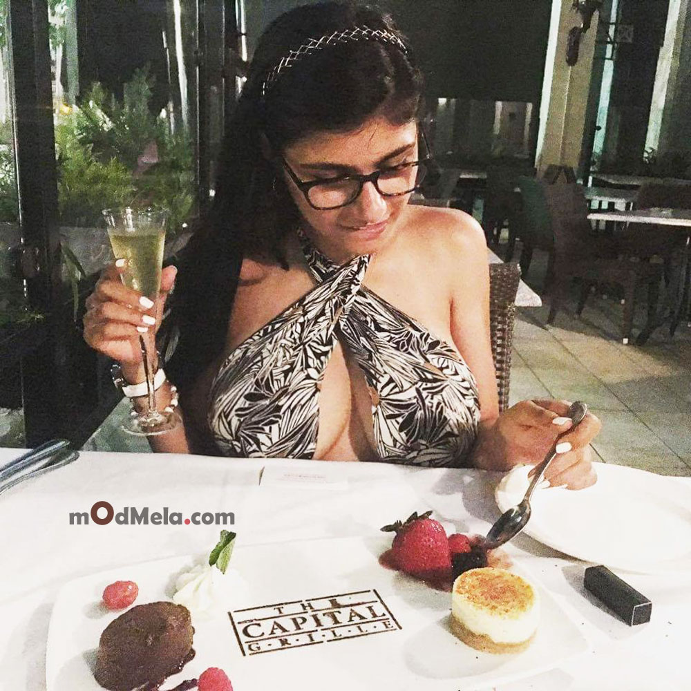 mia khalifa eats in restaurant lovely dress